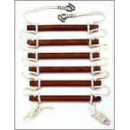 Child-works-roped-ladder-with-dowels 0 145x145.jpg